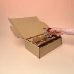 Branded candle shipping mailer boxes with custom inserts for safe ecommerce delivery across the UK